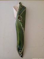 Full view of cone-shaped wall pocket vase showing glaze colors and Calla Lily detail