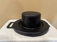 Side view of black Bencraft hat box closed