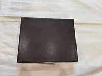 Closed dark brown faux leather Milano jewellery box top view