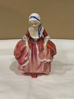 Front view of Royal Doulton Goody Two Shoes figurine