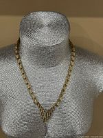 Necklace on mannequin displaying overall drape and shape