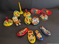 Group view of all tin toys and noisemakers