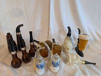 Group shot of all twelve Avon pipe decanters