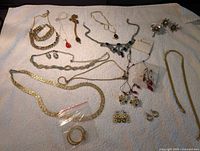 Full group shot of all jewelry items laid out on towel