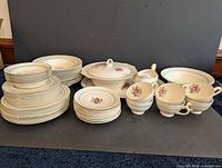 Full lot showing plates, bowls, covered dish, gravy boat and cups