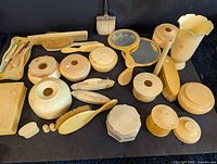 Full layout of all ivory celluloid dresser items