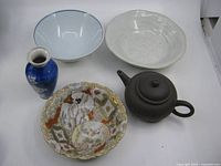 Group shot of all five pottery items