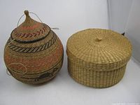Both baskets side by side showing overall shapes and lids