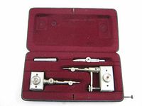 Open case showing all instruments in burgundy felt interior