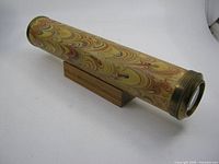 Side view of kaleidoscope on stand