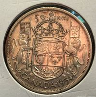 Reverse of 1954 Canada 50-cent coin showing coat of arms
