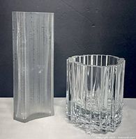 Both vases side by side showing forms and heights