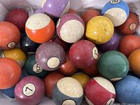 Box of assorted coloured numbered balls