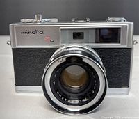 Front view of Minolta Hi-Matic 7s showing body and lens
