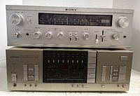 Front view of both Pioneer SX-8 and Sony STR-6055 receivers stacked