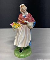 Front view of Royal Doulton "Market Day" figurine