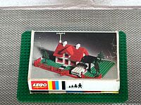 Top of LEGO 346 box showing house graphic and logo strip