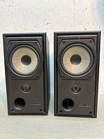 Front view of both Mission 732 speakers showing drivers, tweeters and ports