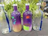 All four bottles side-by-side