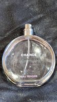 Front view of Chanel Chance Eau Tendre bottle showing liquid level and missing cap