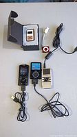 Group shot of all five MP3 players with cables