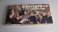 Box lid with Masterpiece artwork and Parker Brothers branding