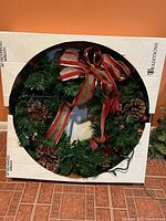 Wreath in box showing overall view with bow and decorations