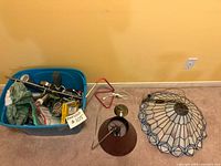 Lot overview with tote, red desk lamp frame, metal pendant and stained glass shade