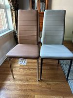 Front view of two chairs showing color and upholstery