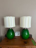 Both table lamps front view on wooden surface