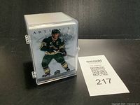 Front view of case showing Artifacts card with Minnesota Wild captain