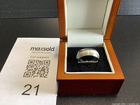 Ring in presentation box with MaxSold lot card
