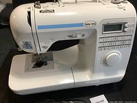 Front and right side view of Baby Lock sewing machine