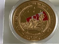 Reverse of coin with colorized Canadian flag, soldiers, inscriptions