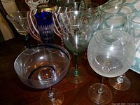 Group of assorted stemmed glasses showing colors and patterns