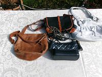 Group shot of all four leather purses