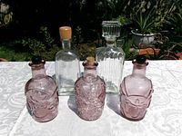 Front view of all five decanters on table
