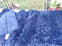 Full view of navy faux fur side
