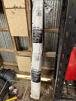 Full roll standing upright showing Everbilt Super Six label
