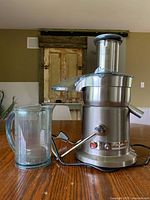 Front view of Breville juicer with pitcher