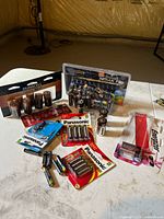 All battery packs and loose cells displayed on table