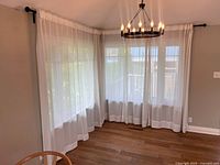 Overall view of corner blinds, rods and panels