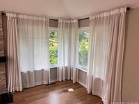 Full view of corner blinds installed on two adjacent windows