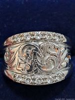 Front view showing scroll design and accent stones