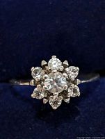 Front view of cluster ring showing clear stones arrangement