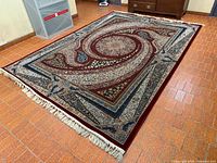 Full view of rug showing overall pattern and fringe