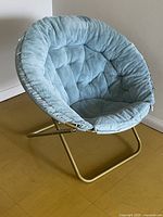 Full view of saucer chair front angle