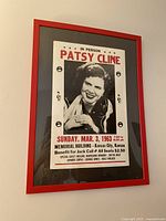 Front view of framed concert poster