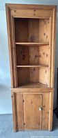full view of pine corner cabinet