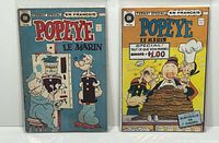 Both Popeye Le Marin comics front covers in bags
